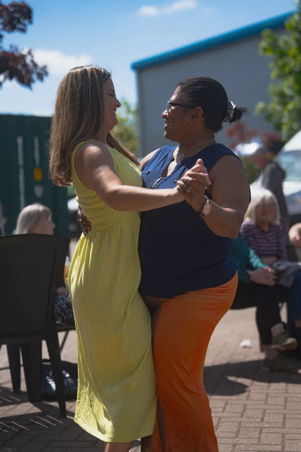 Two guests dancing together
