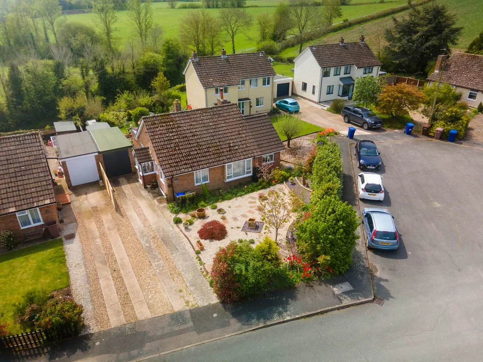 Aerial view of the Cavendish bungalow, drive and neighbouring houses