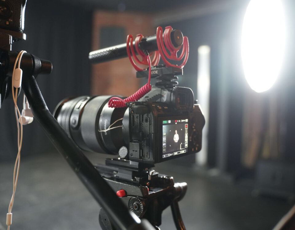 Cinema camera with external microphone and monitor set up for an interview