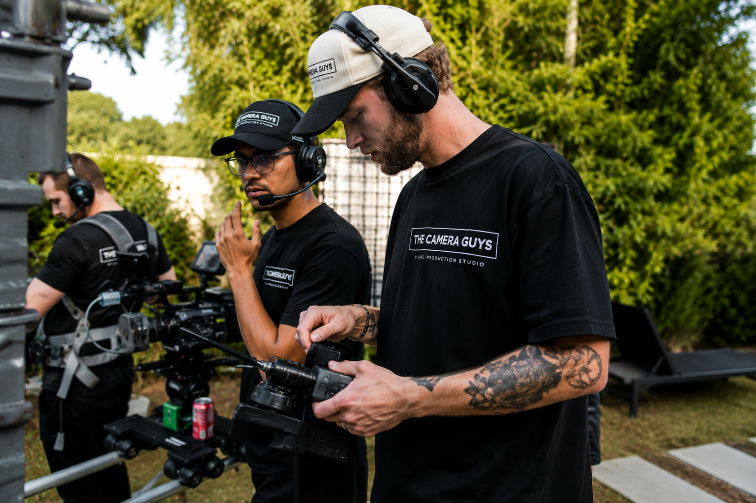 Three Camera Guys videographers working with cinema cameras during an outdoor shoot