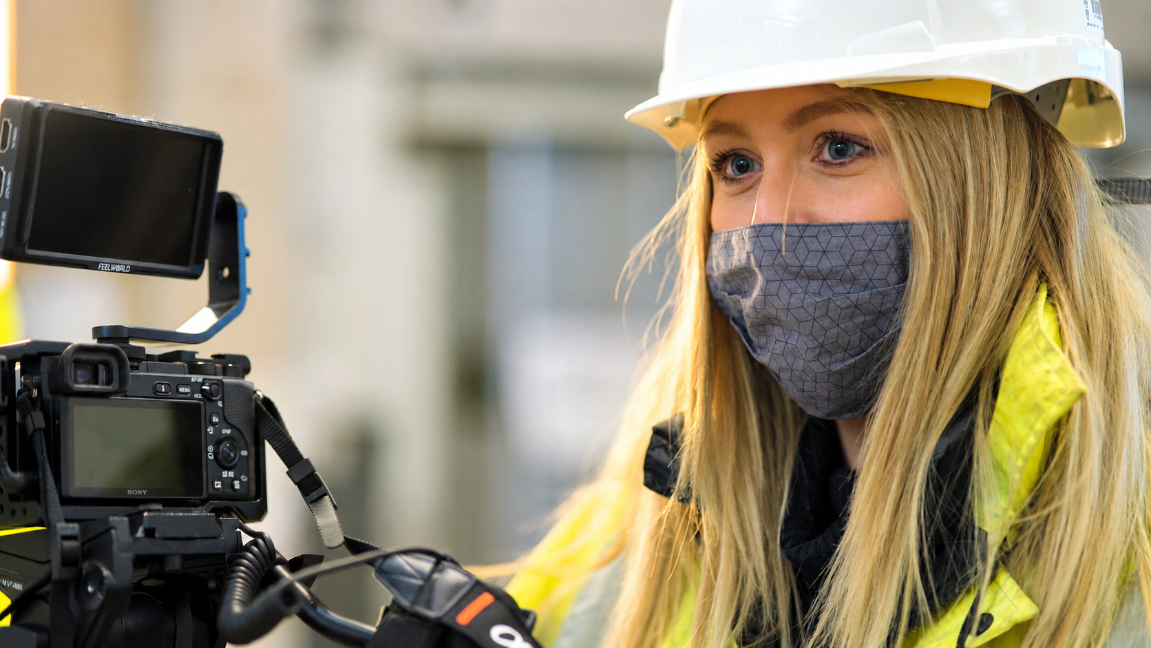 Female Camera Guys videographer working on location in London
