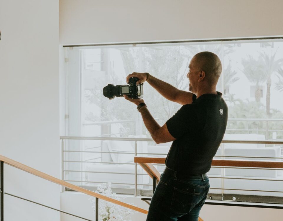 Photographer working during a professional indoor photo session