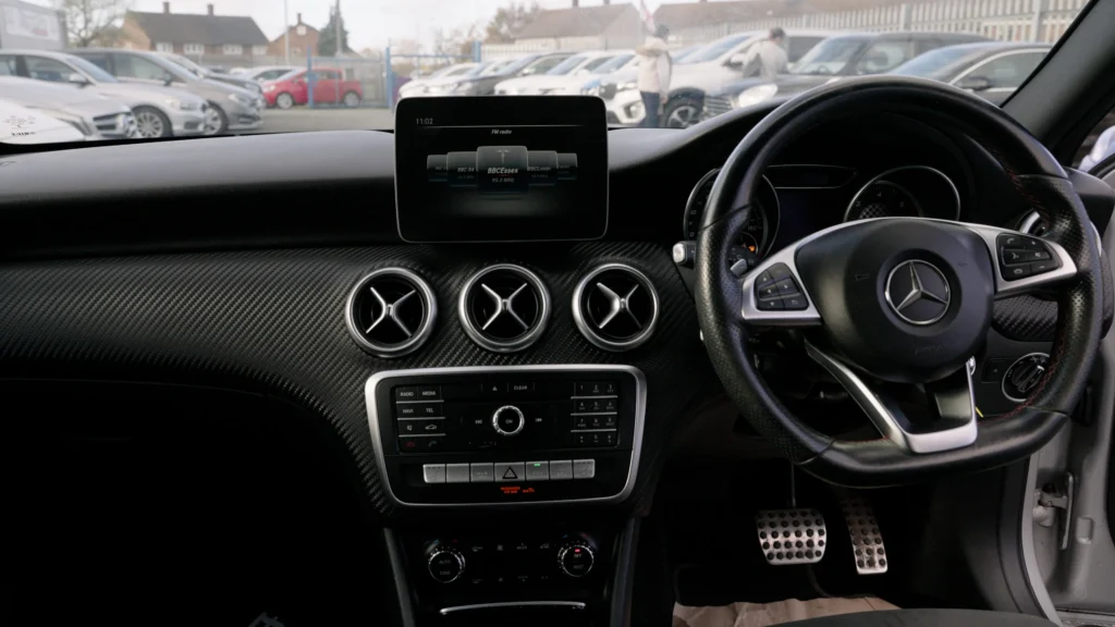 Mercedes dashboard and branded interior details filmed for a dealership video
