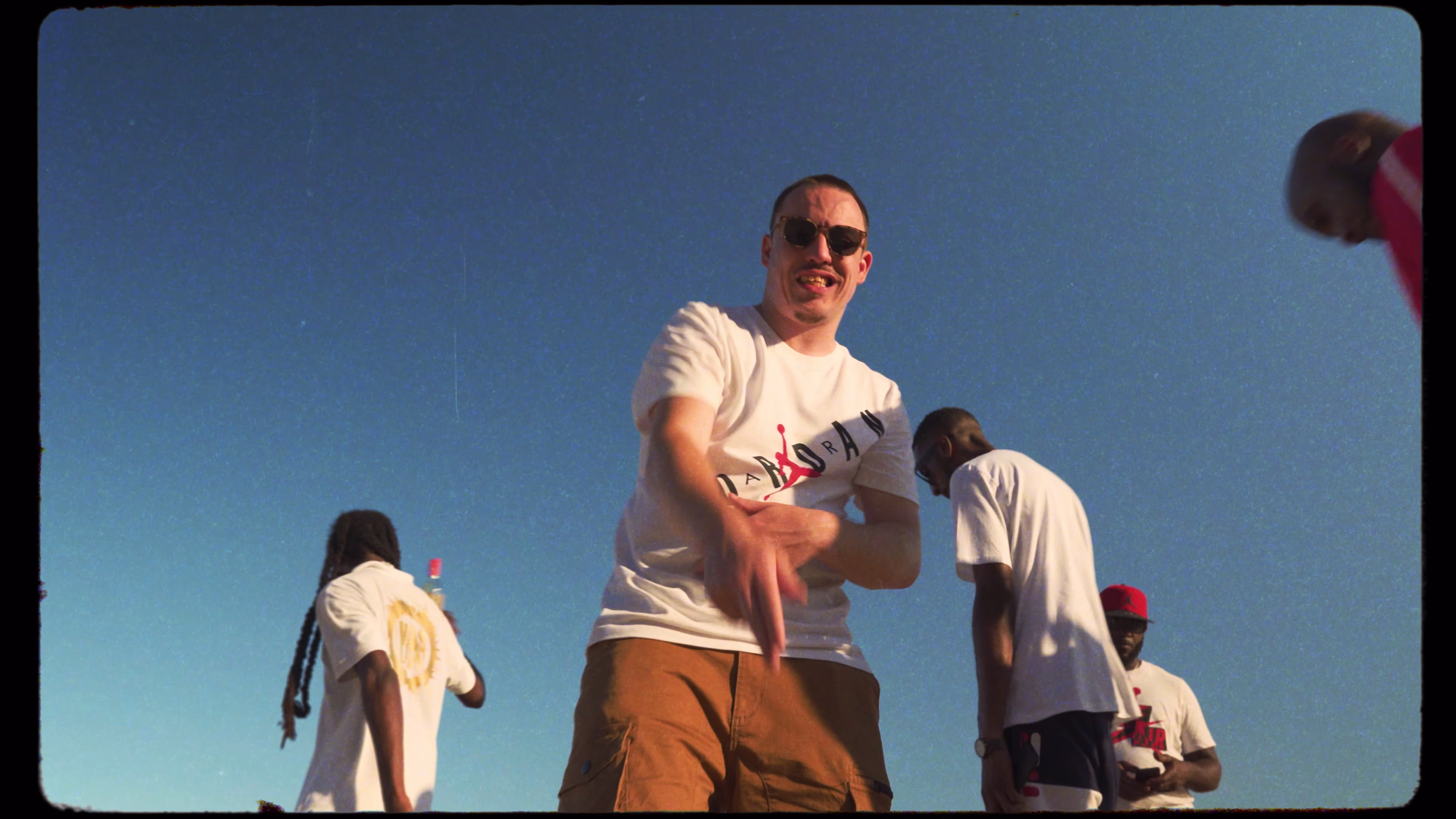 Low-angle coastal performance from the 30 Degrees music video