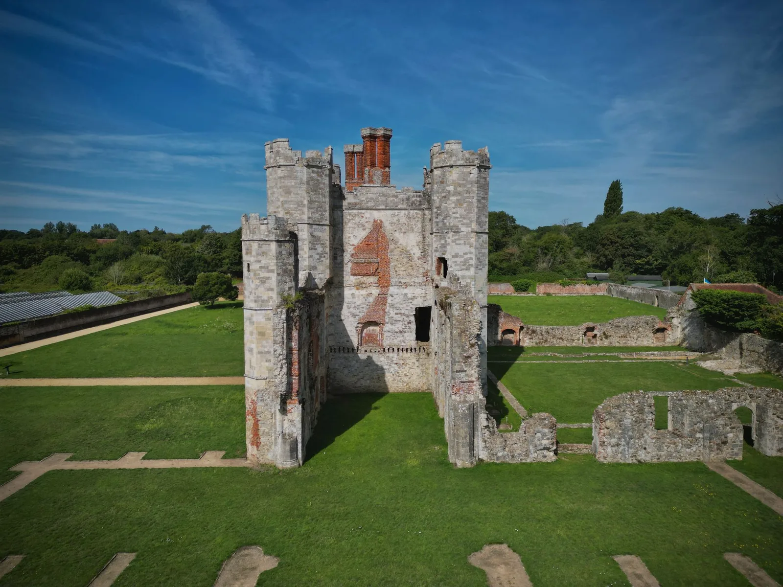Aerial view of Titchfield Abbey in its surrounding landscape