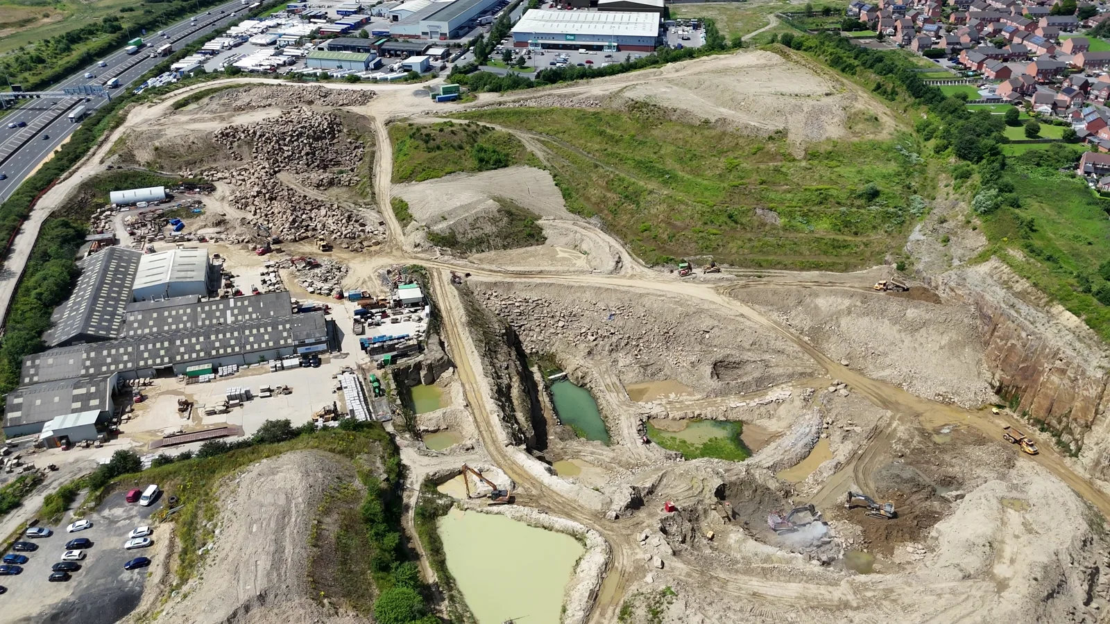 Aerial view across an active English quarry