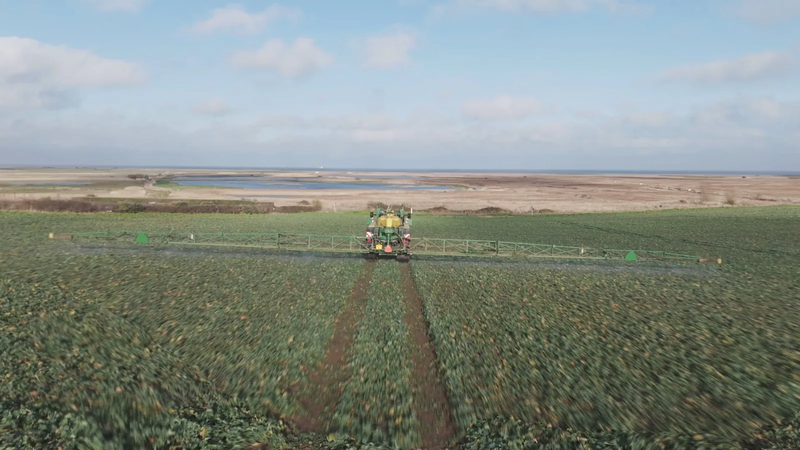 Tractor working across Norfolk farmland in the Sentry production