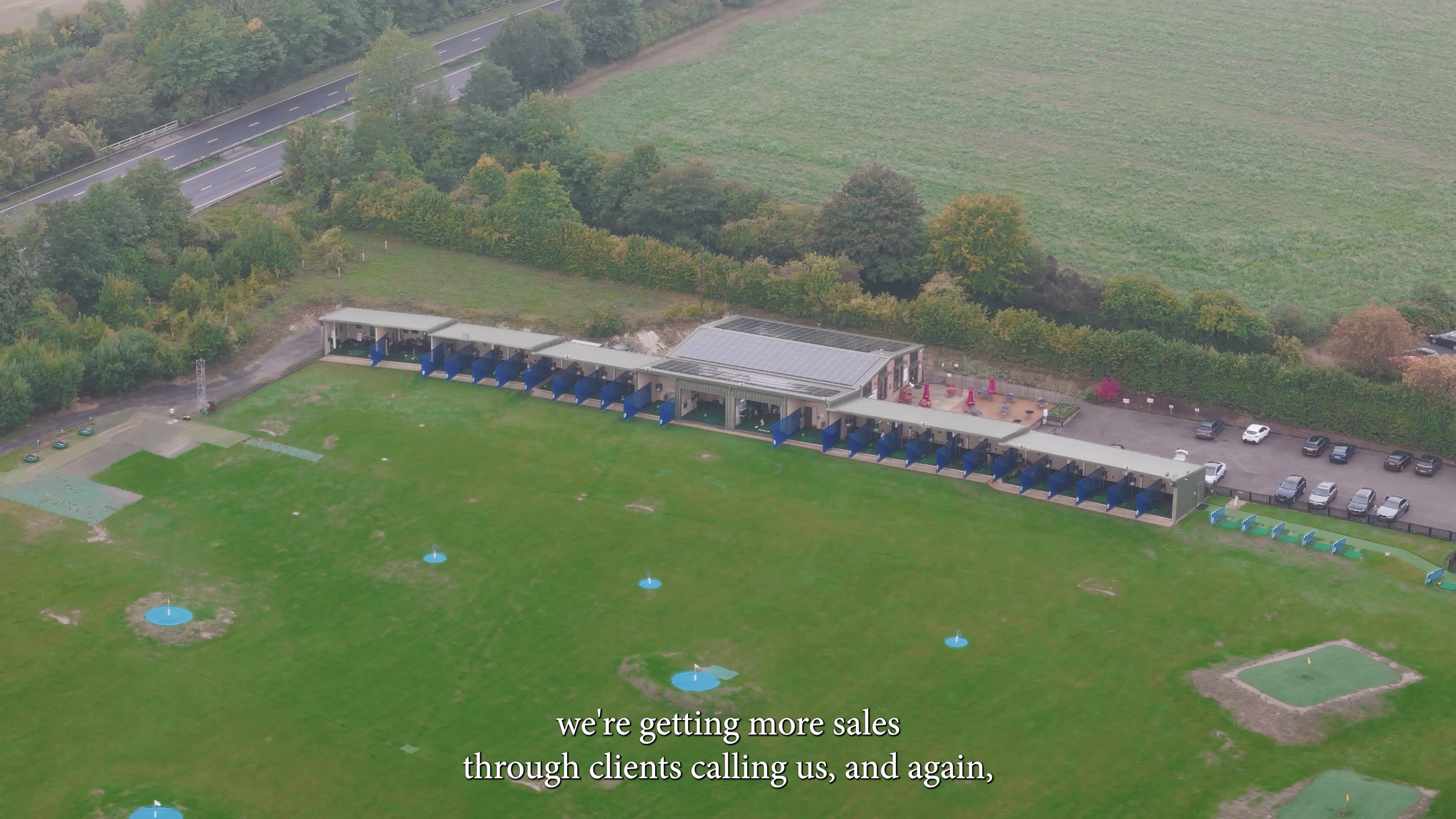 Aerial view of the driving range and buildings at Winchester Golf Academy