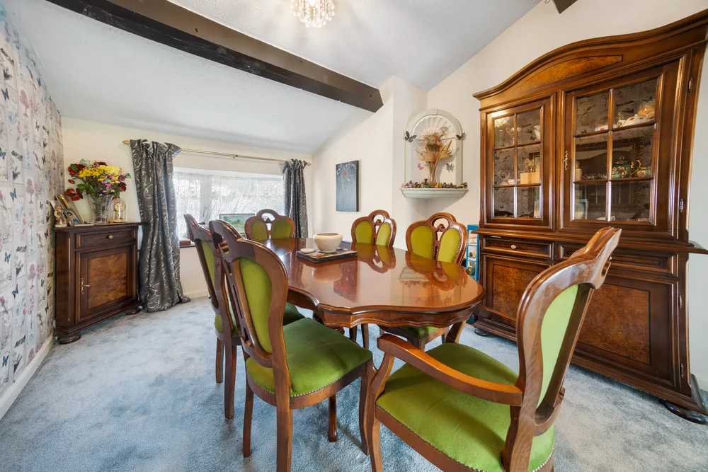 Dining room with timber table and dresser — 13 Furness Close