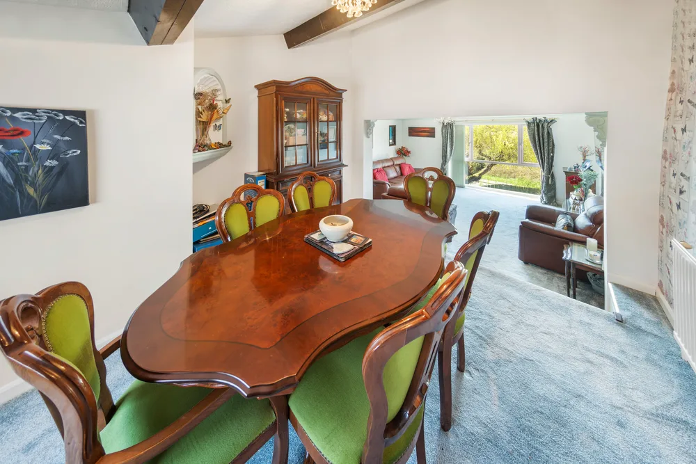 Dining area beside a window — 13 Furness Close
