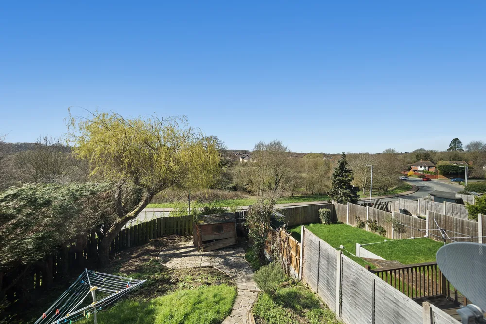 Rear garden and surrounding trees — 13 Furness Close