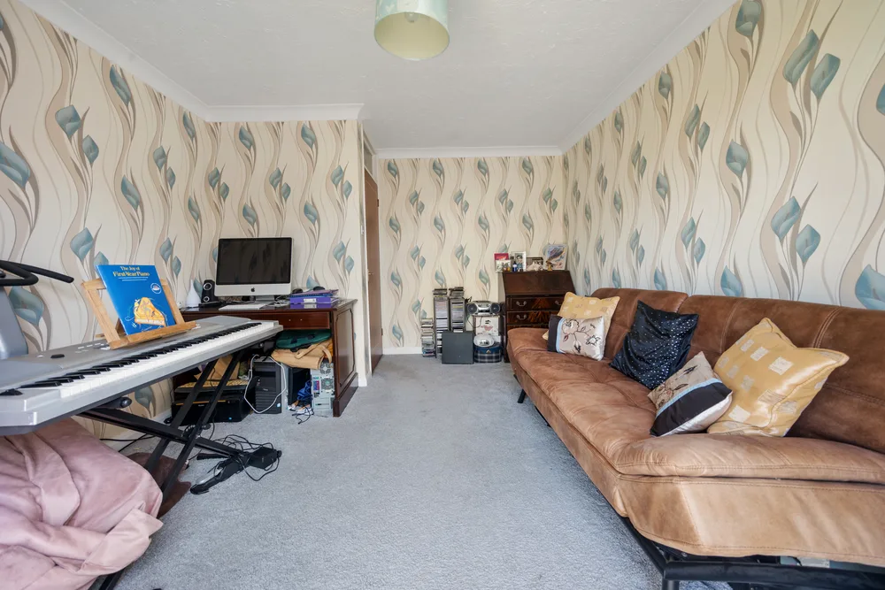 Sitting room and piano — 13 Furness Close
