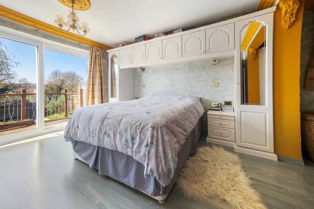 Bedroom with timber ceiling beams — 13 Furness Close