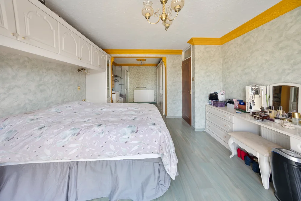Bedroom with garden view — 13 Furness Close