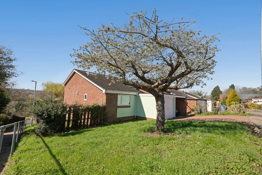 Front garden and neighbouring rooftops — 13 Furness Close