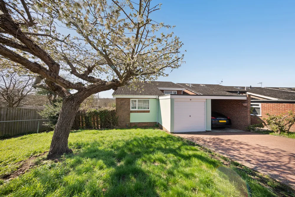 Entrance beneath a flowering tree — 13 Furness Close