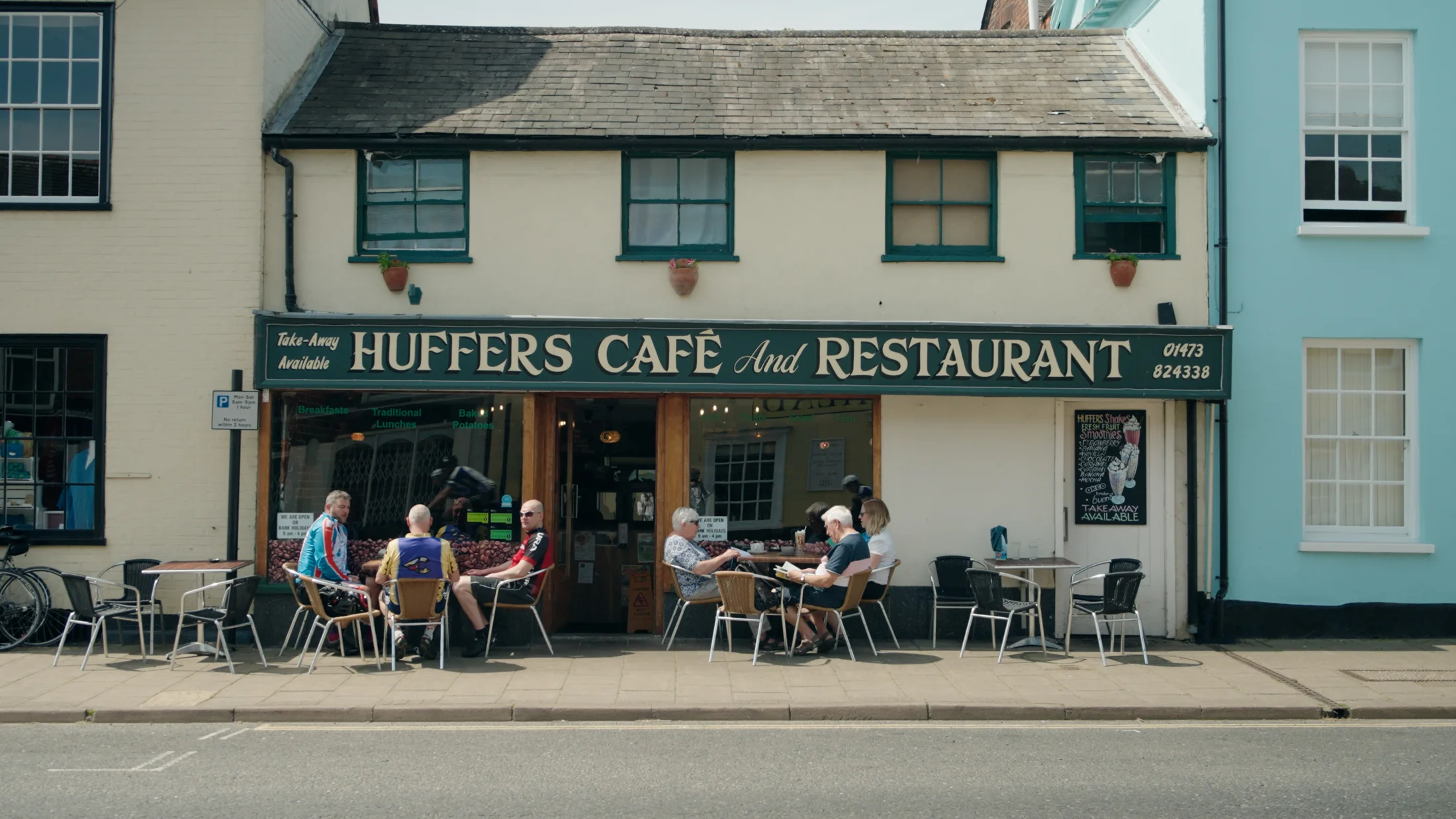Cafe frontage and pavement seating in Hadleigh — film still