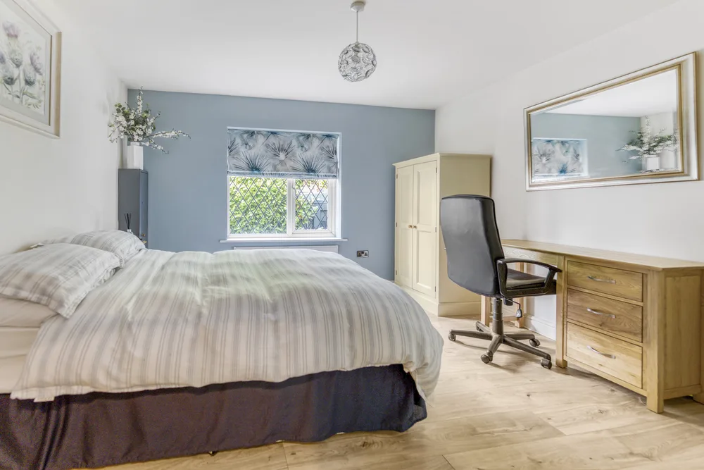 Bedroom with garden-facing windows — Vancouver, Brockley