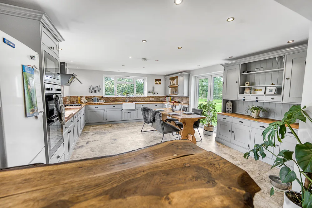 Kitchen opening into the dining area — Vancouver, Brockley