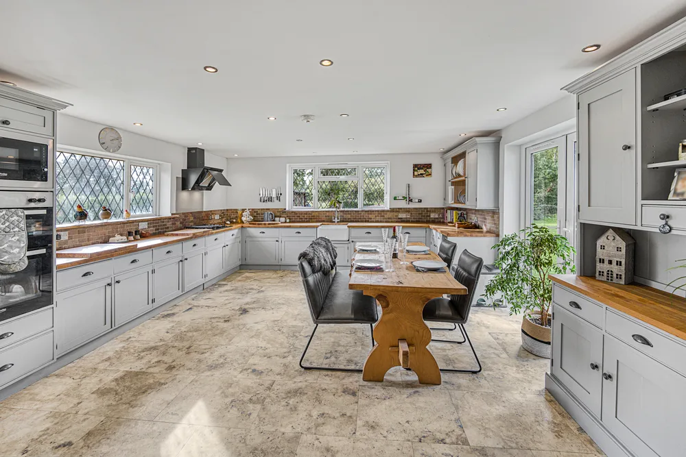 Kitchen island and garden-facing windows — Vancouver, Brockley