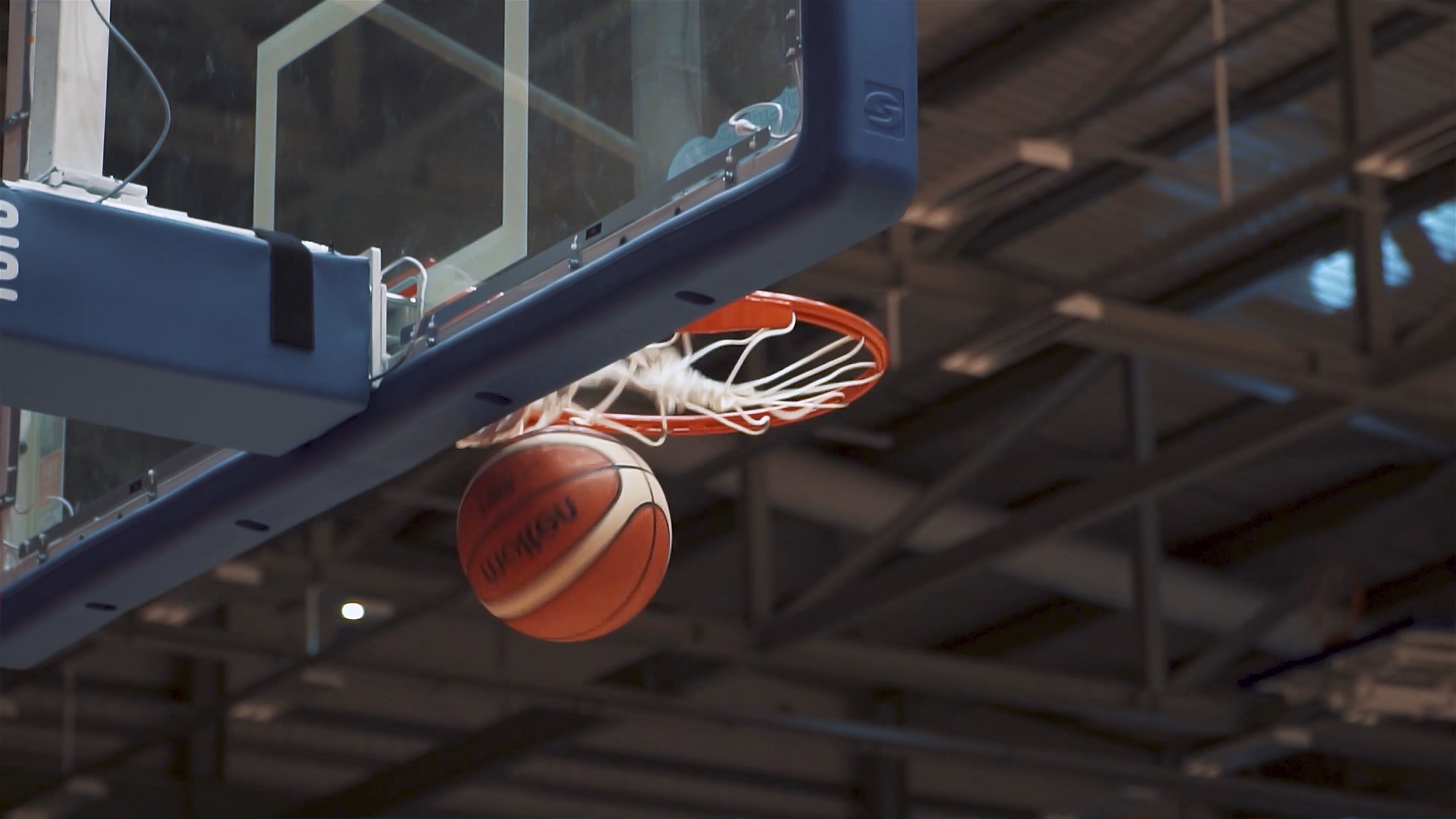 Basketball dropping through the hoop at Essex Sport Arena