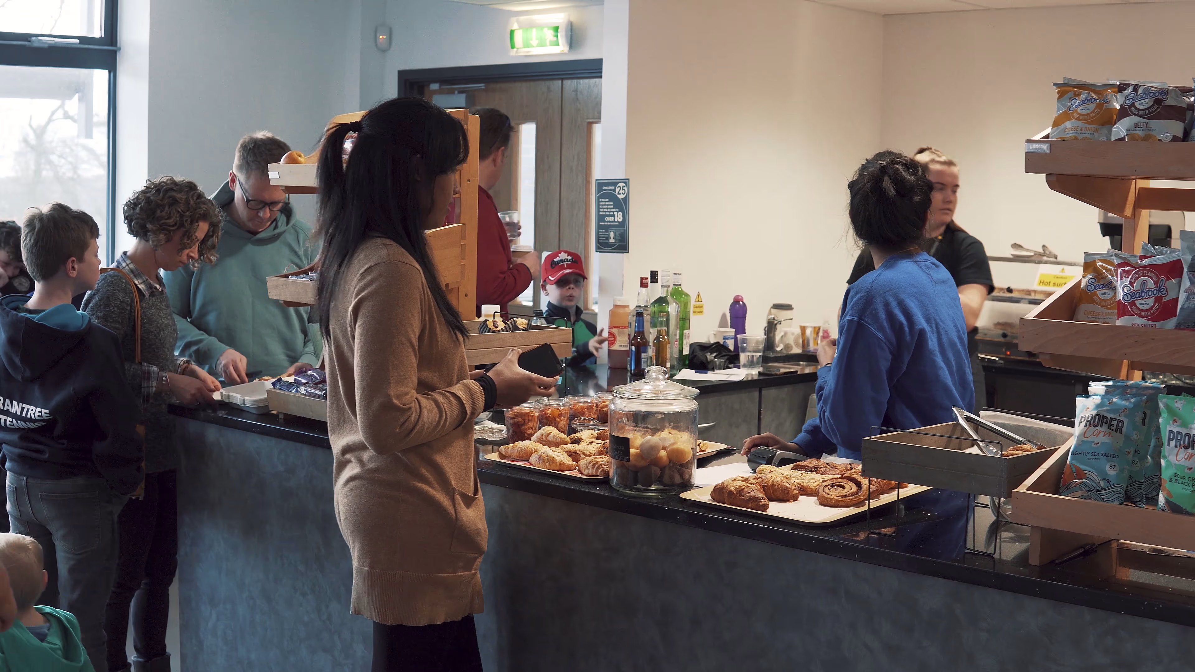 Visitors at the café counter during Essex Rebels match day