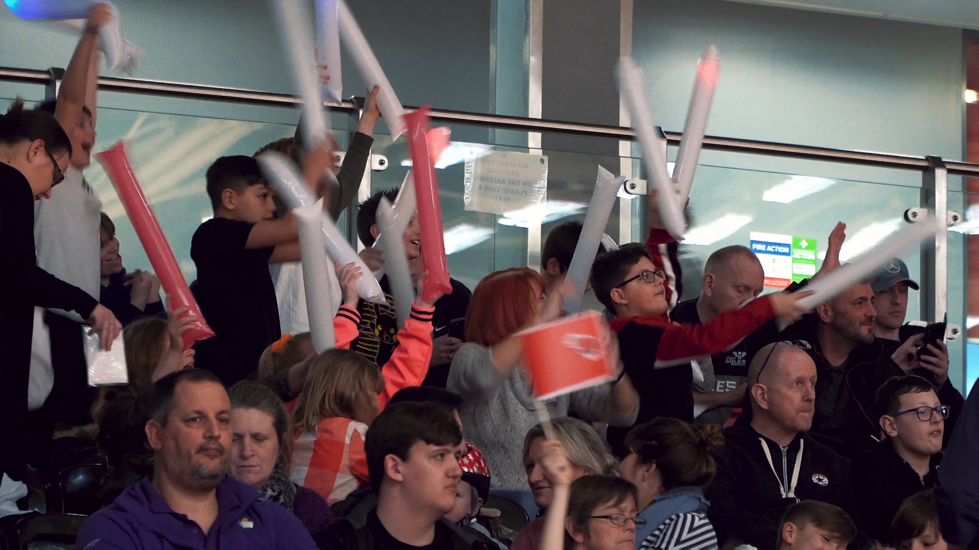 Essex Rebels supporters cheering from the stands