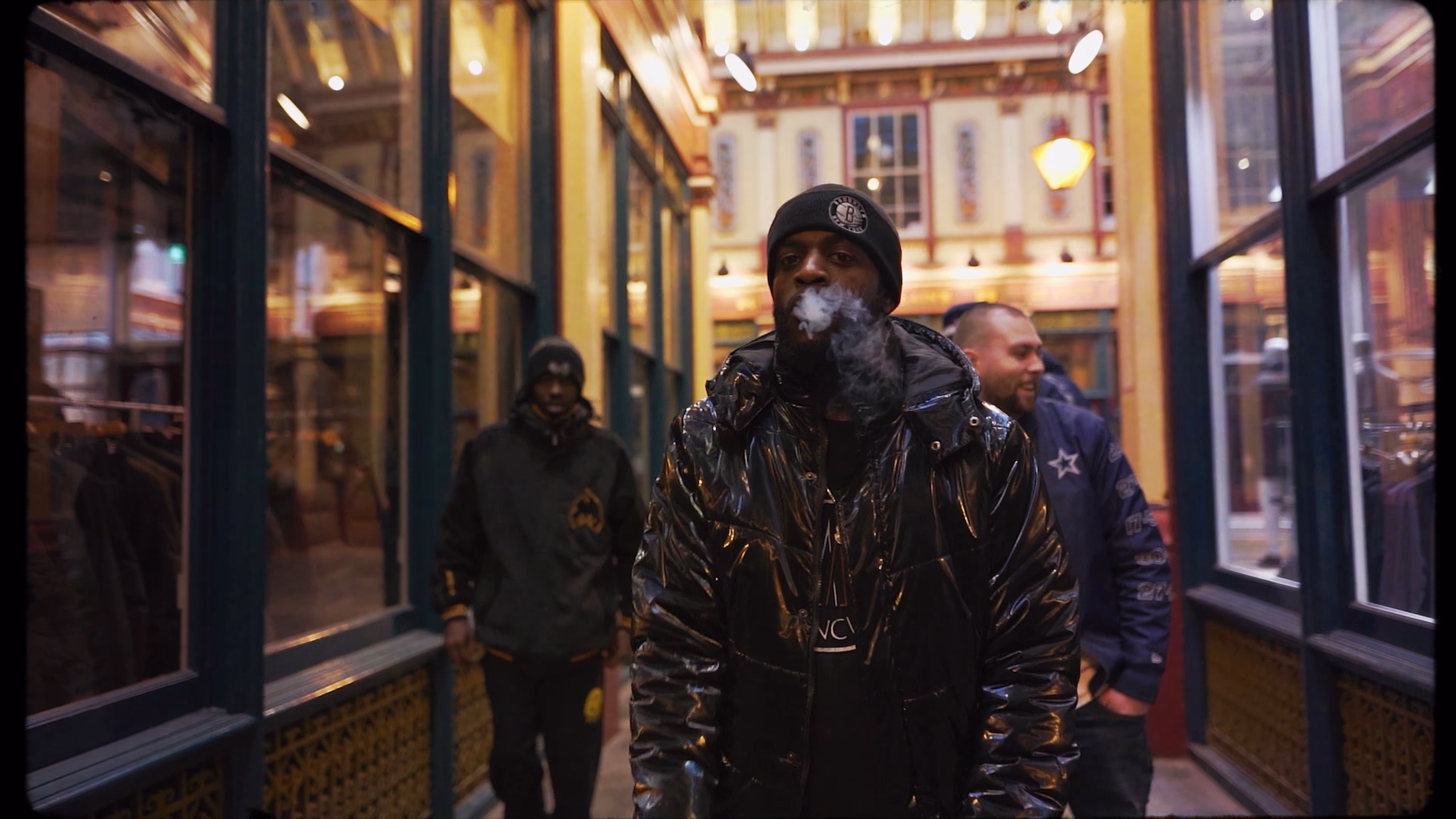 New Guardz performing beside the shop windows at Leadenhall Market