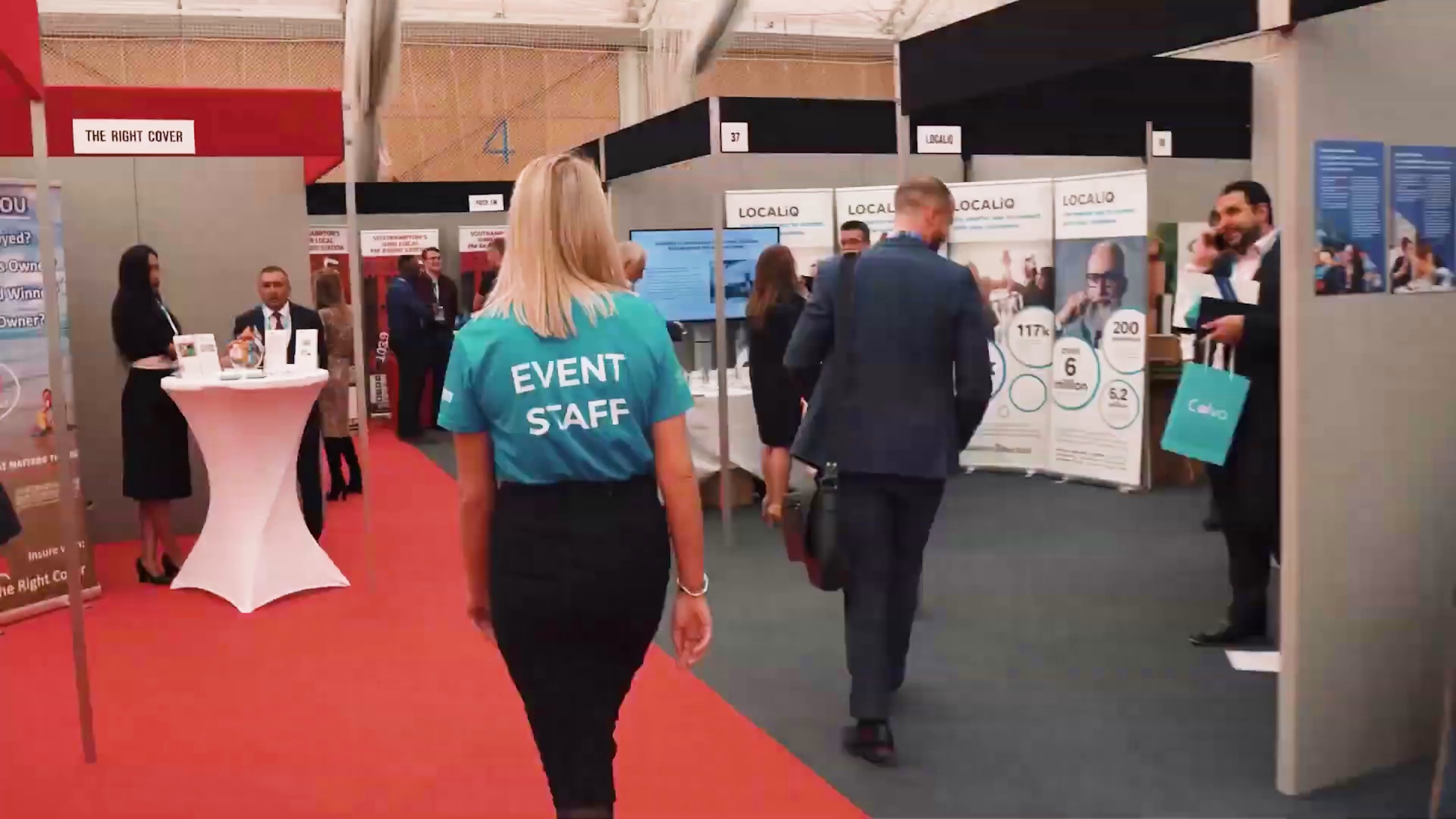 Hampshire Business Show event staff walking through the exhibition