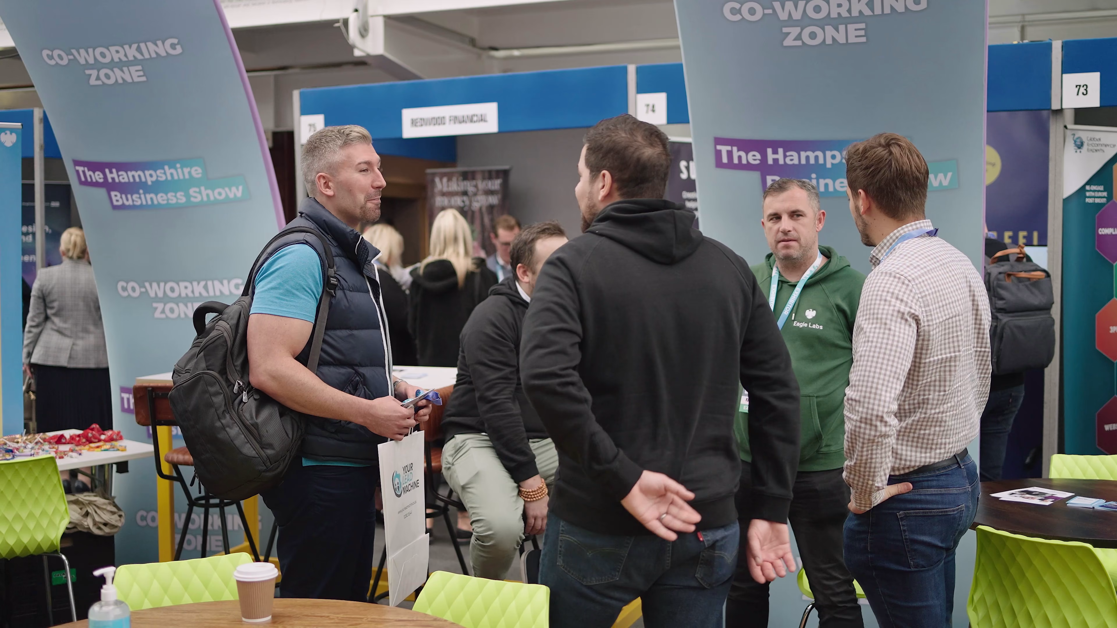 Visitors engaging with an exhibition stand at Hampshire Business Show