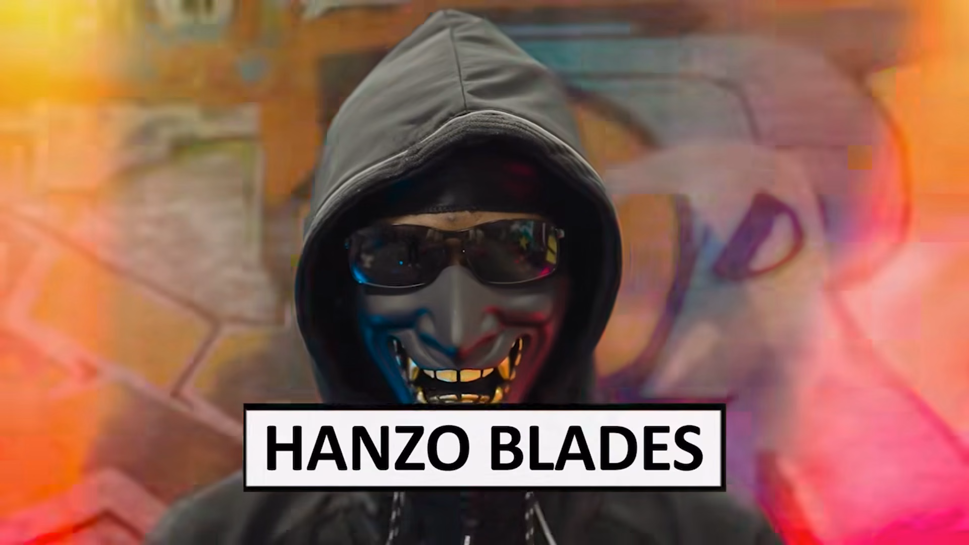 Hanzo Blades masked figure against blurred graffiti colour