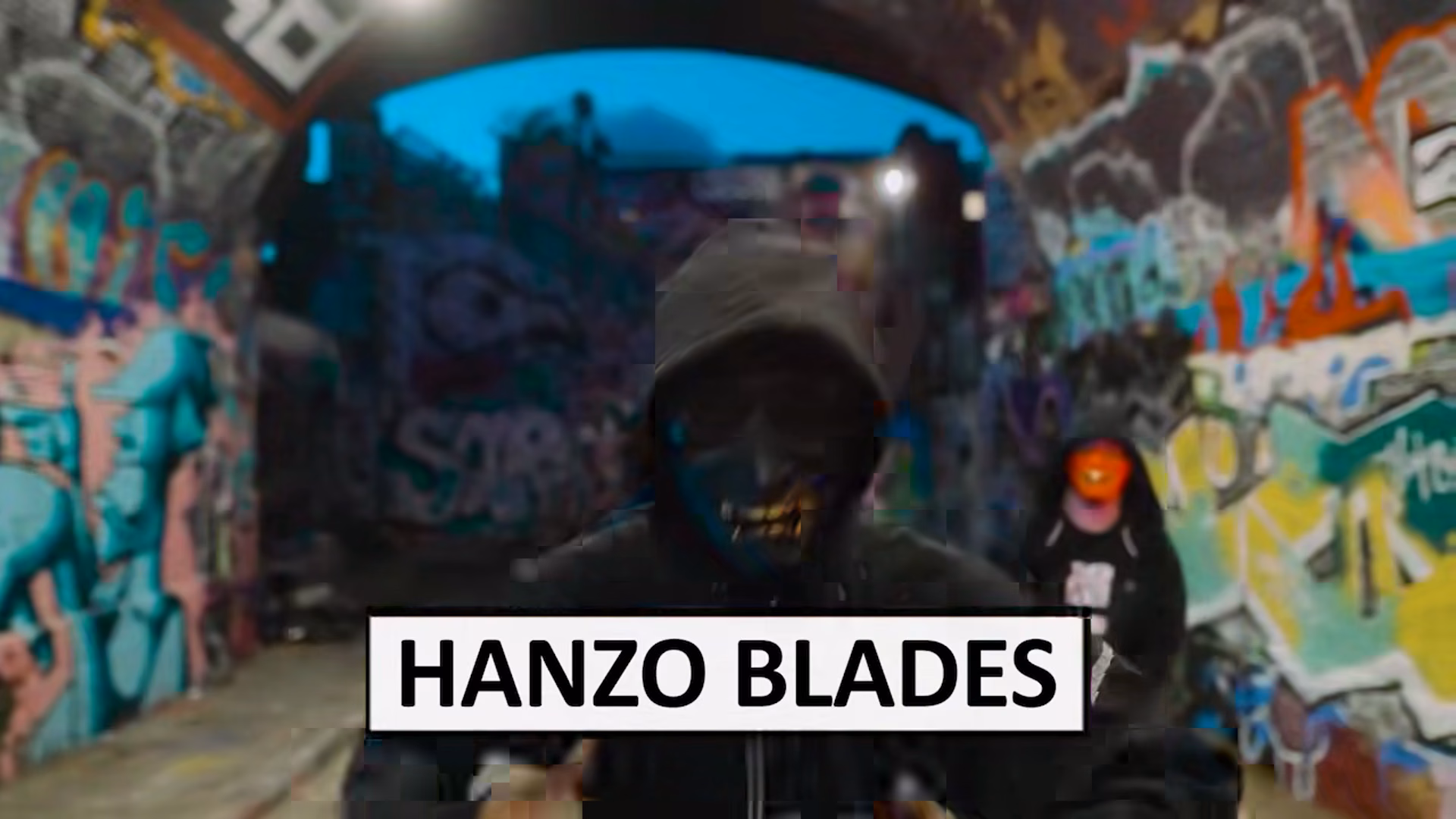 Wide masked performance inside the London Graffiti Tunnel