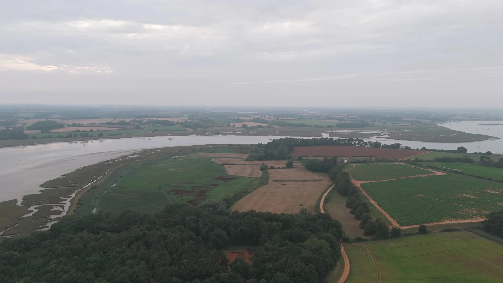 Film still: The River Deben beside the Suffolk countryside