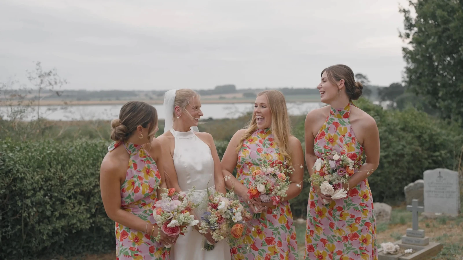 Film still: Harriet with her bridesmaids beside the river