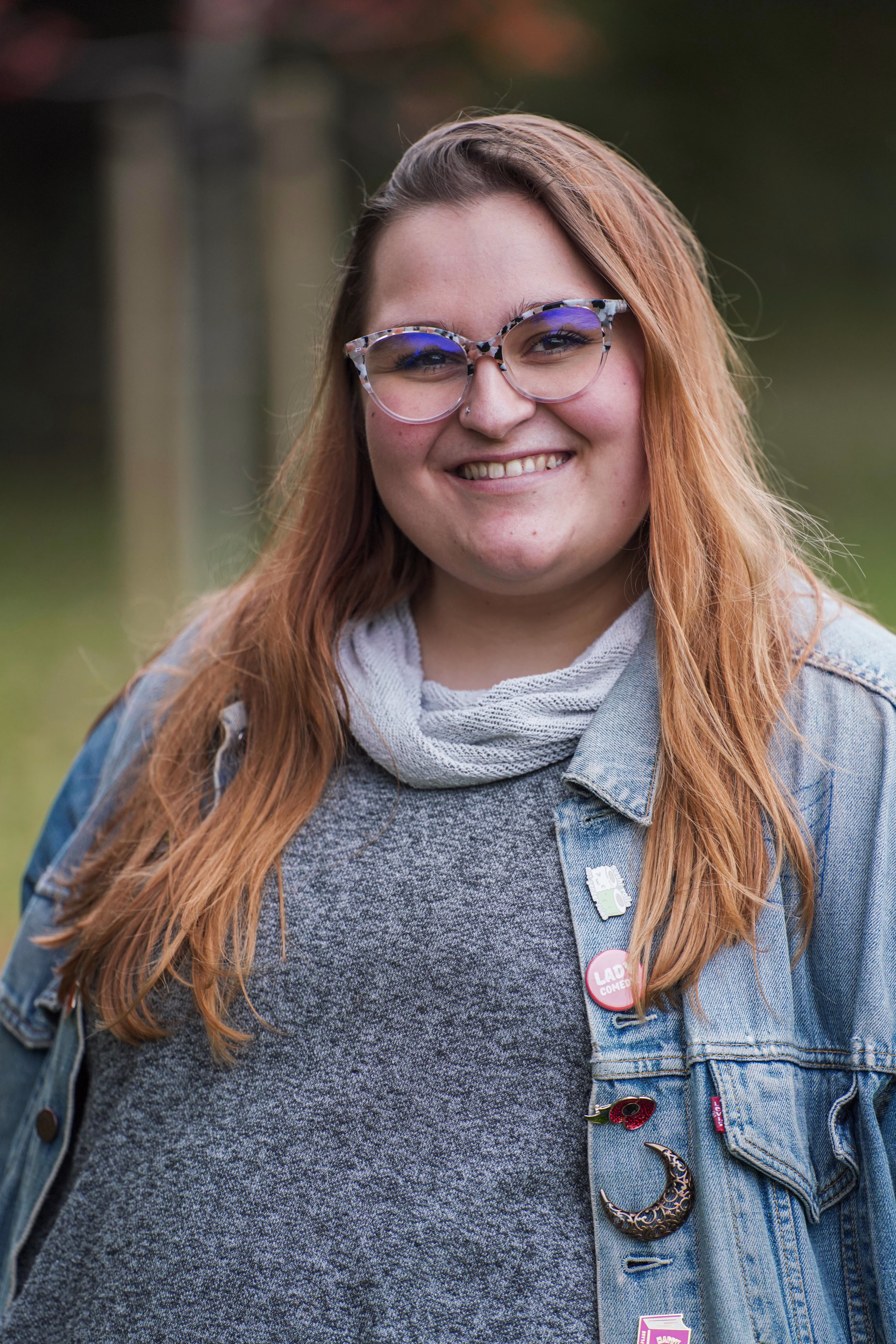 Smiling Hive Kids team member photographed outdoors for the website