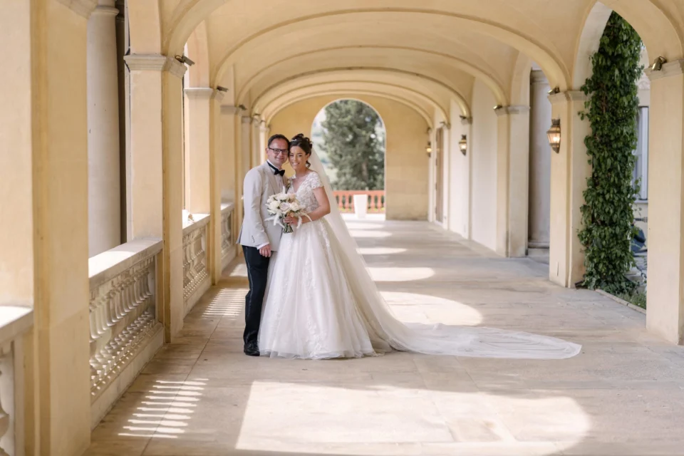 Ellie and Ernie beneath the sunlit arches at Finca Mas Solers