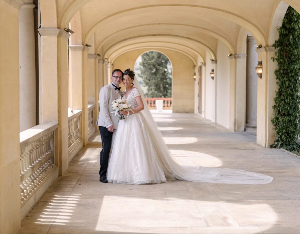 Ellie and Ernie beneath the sunlit arches at Finca Mas Solers