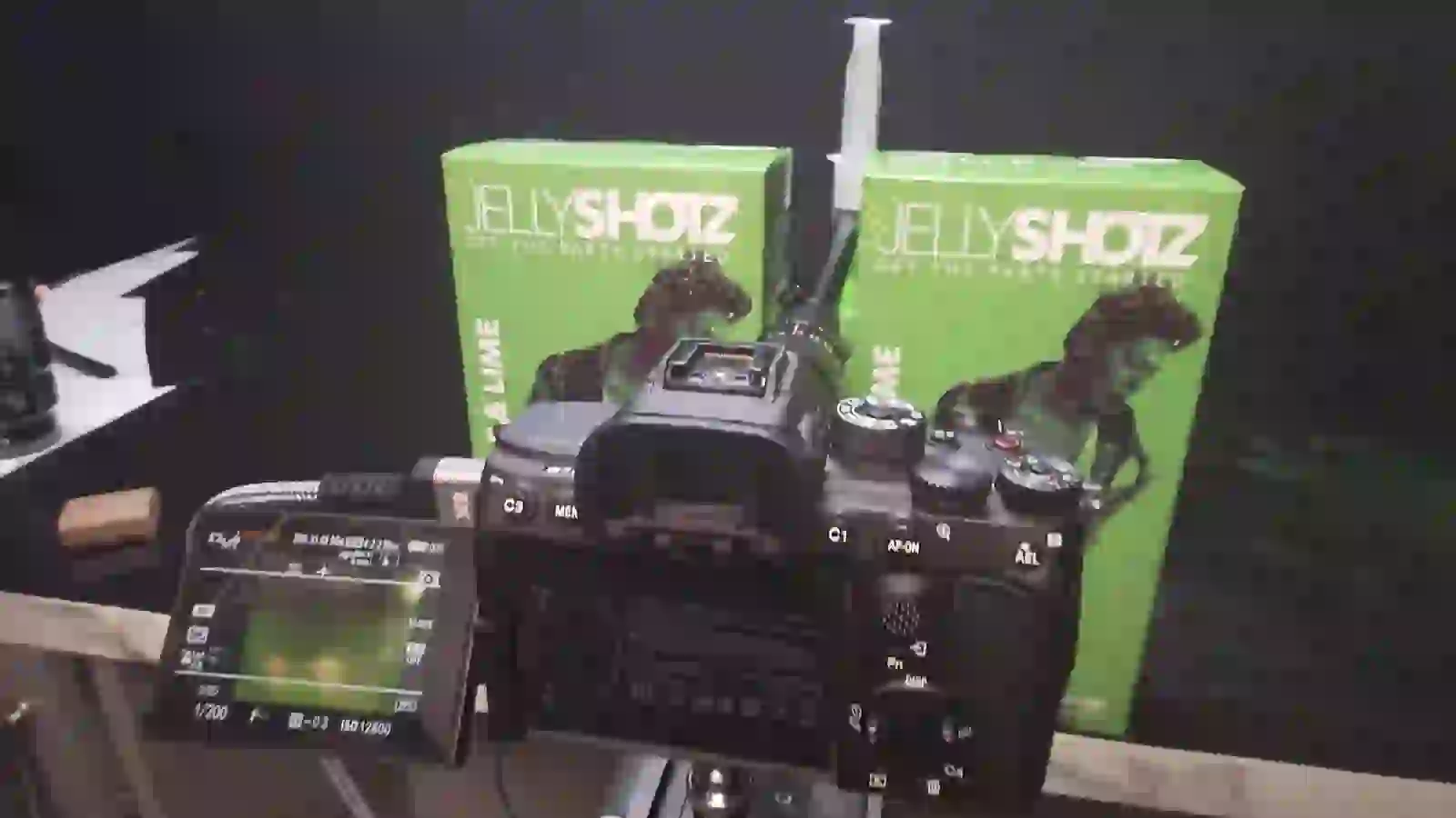 Sony camera and probe lens on the Jellyshotz kitchen product set — phone-video frame