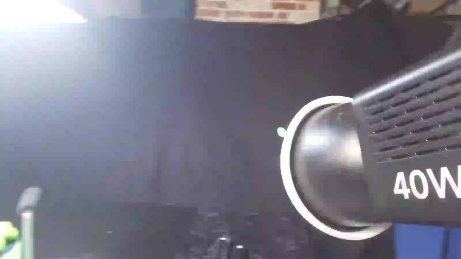 Studio lighting above the Jellyshotz kitchen set — phone-video frame