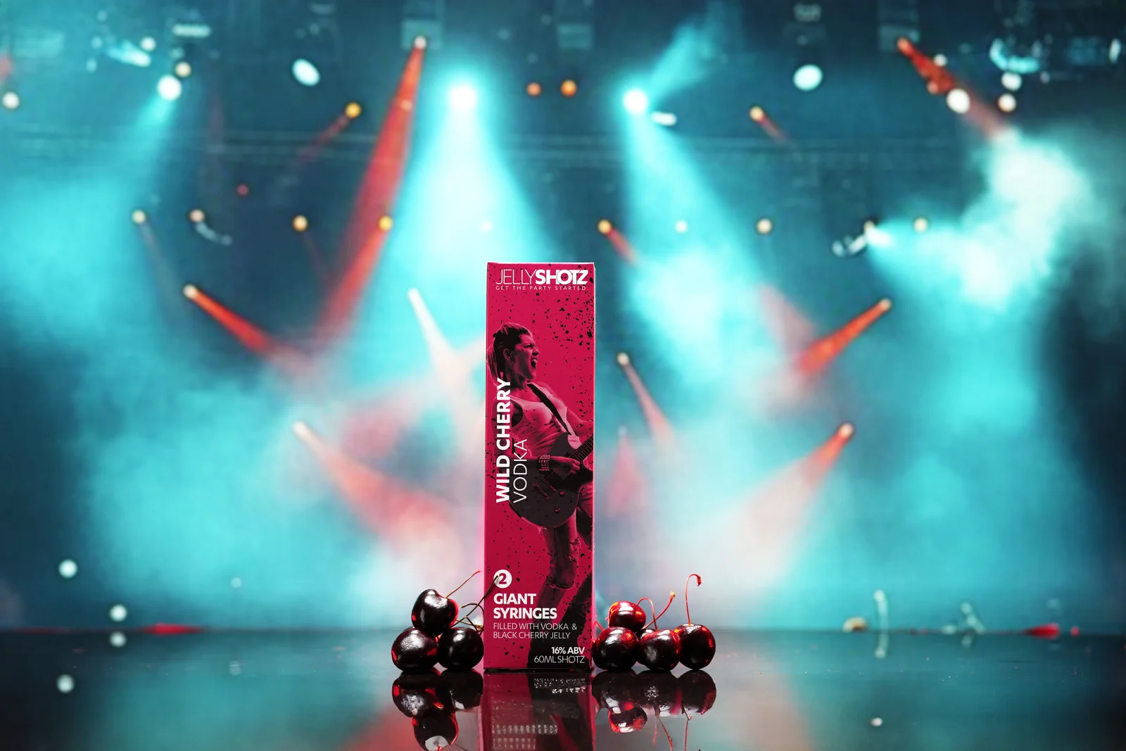 Jellyshotz Wild Cherry Vodka — angled small pack against stage lights