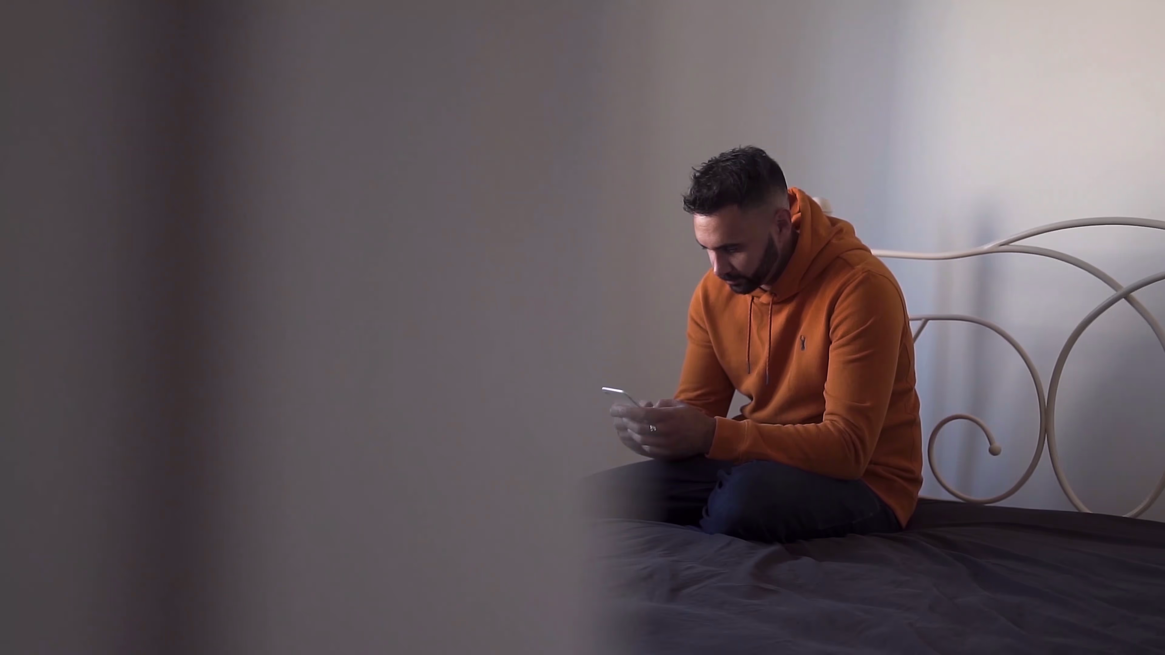 Jake Aldridge sitting alone before the King of the World love story begins