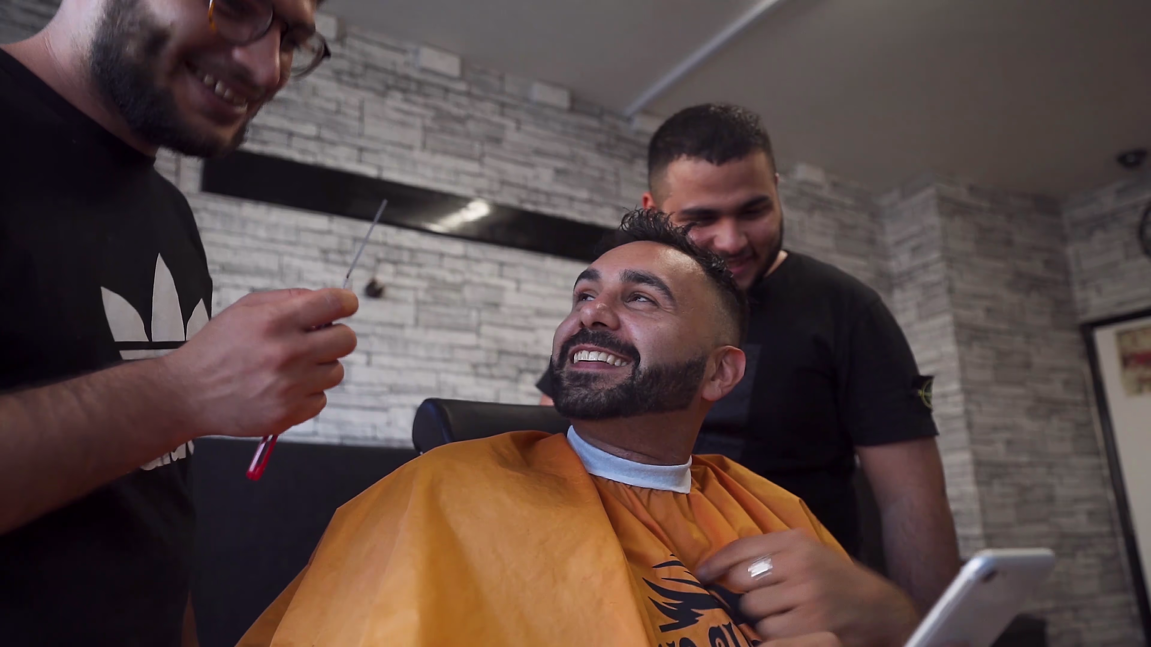 Jake at the barber as the King of the World story moves forward in time