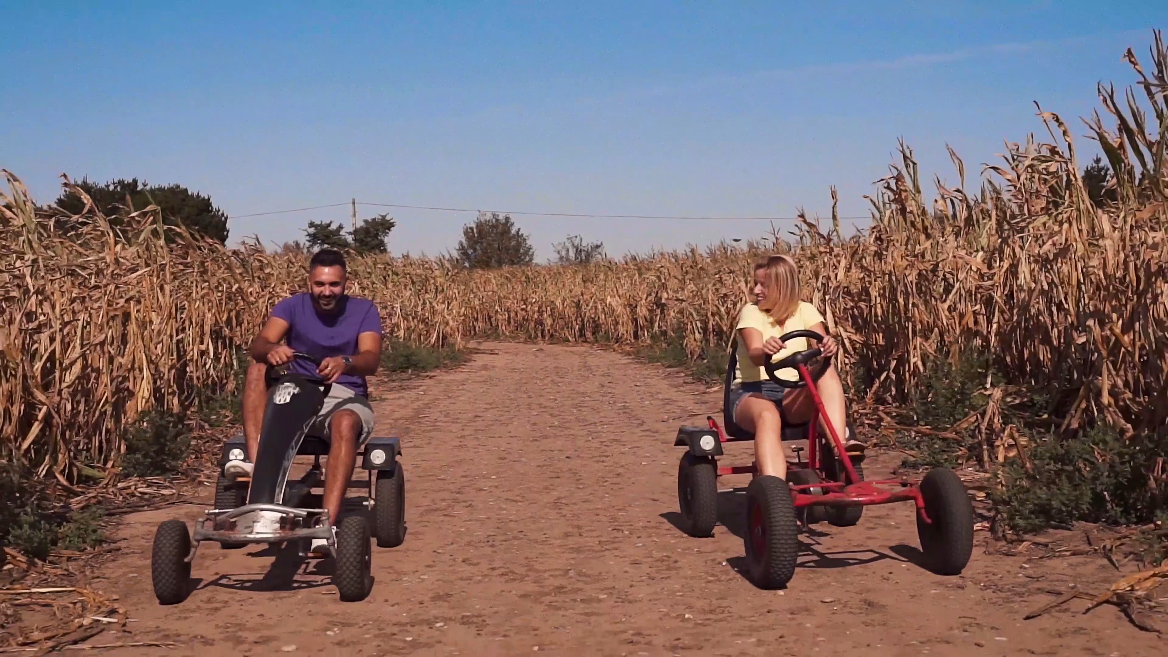Jake and Lisa racing go-karts together