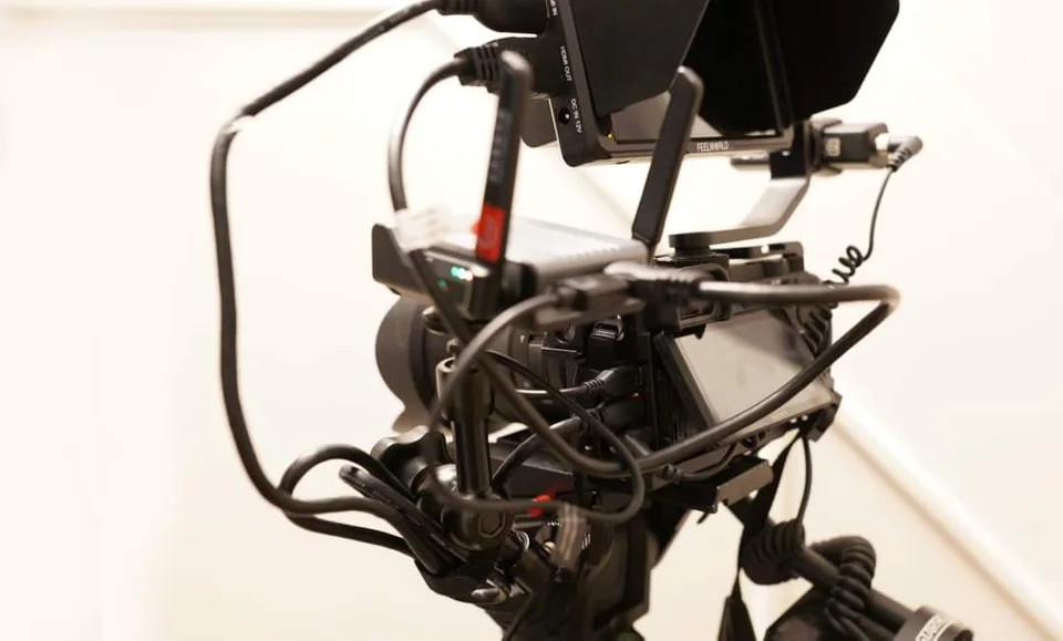 Camera rig with monitor, wireless equipment and connected cabling for live production