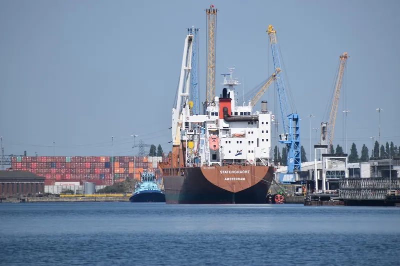 Cargo ship and cranes at Southampton harbour