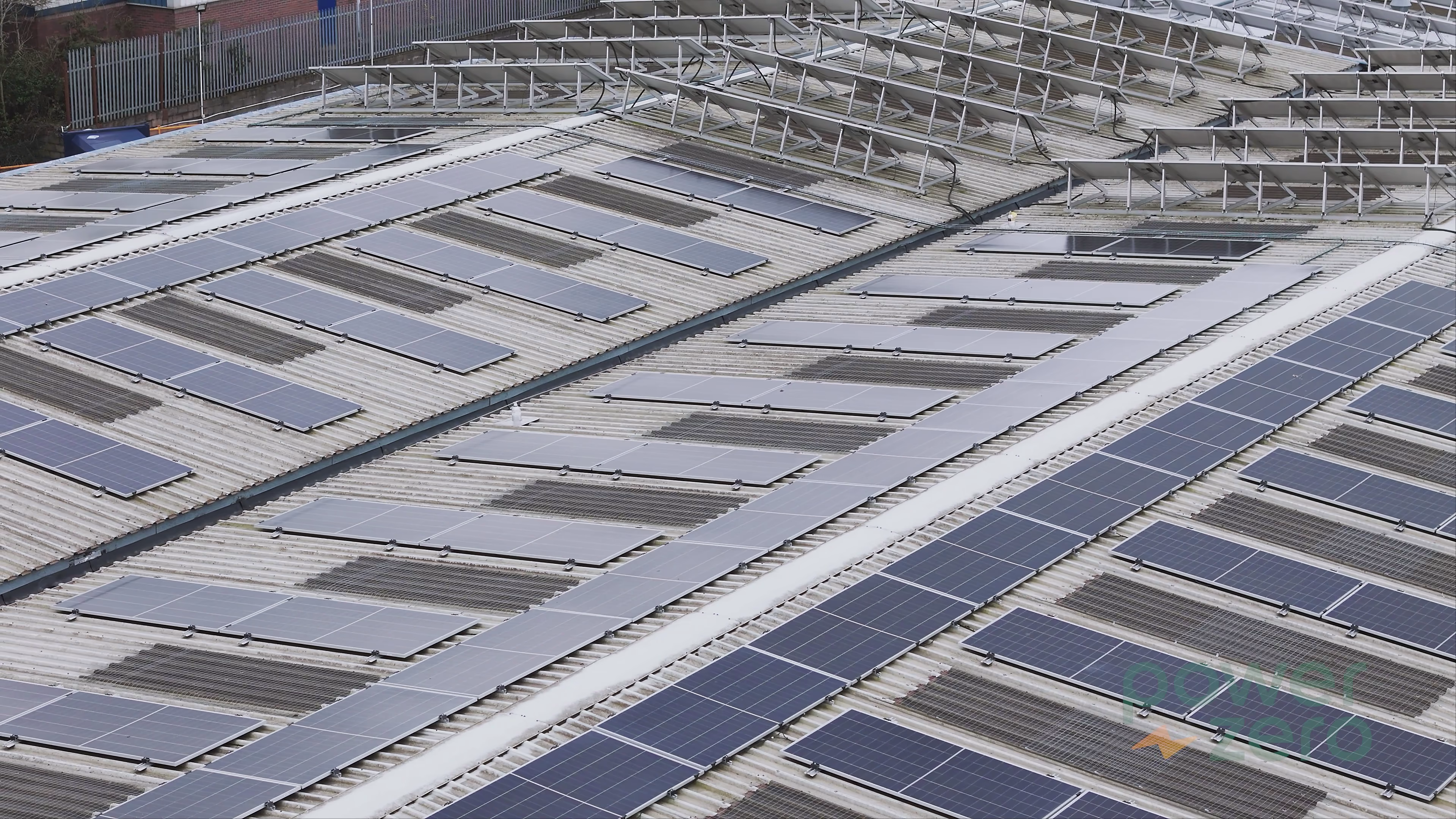 Drone view across the 600kWp Mail Solutions rooftop solar panel installation in Telford