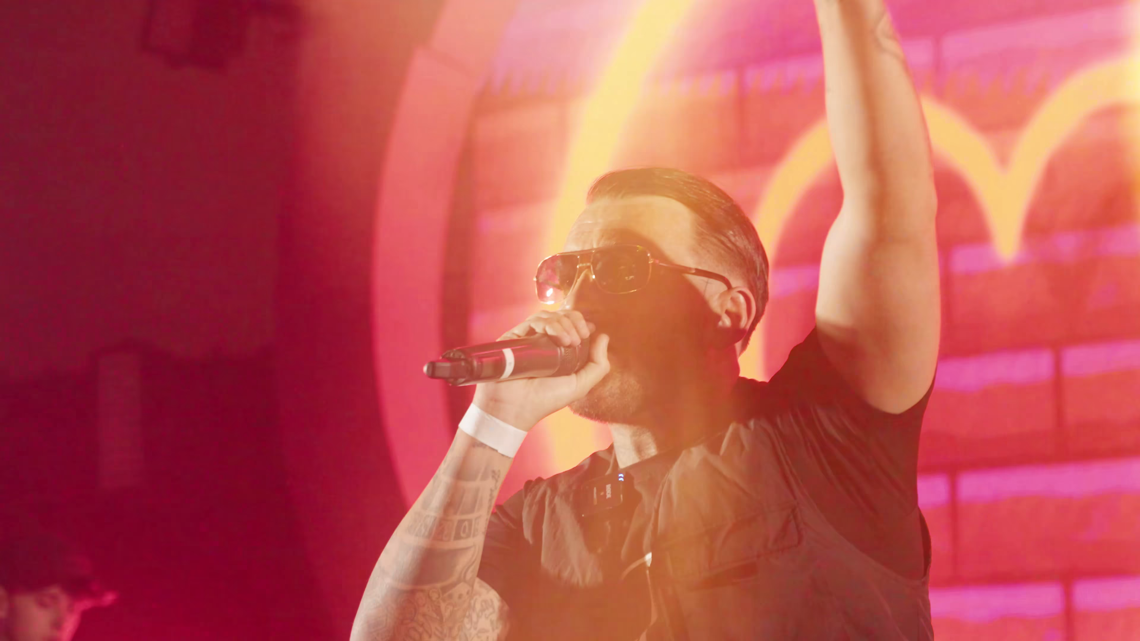 Close-up live performance footage of Maxy Boy