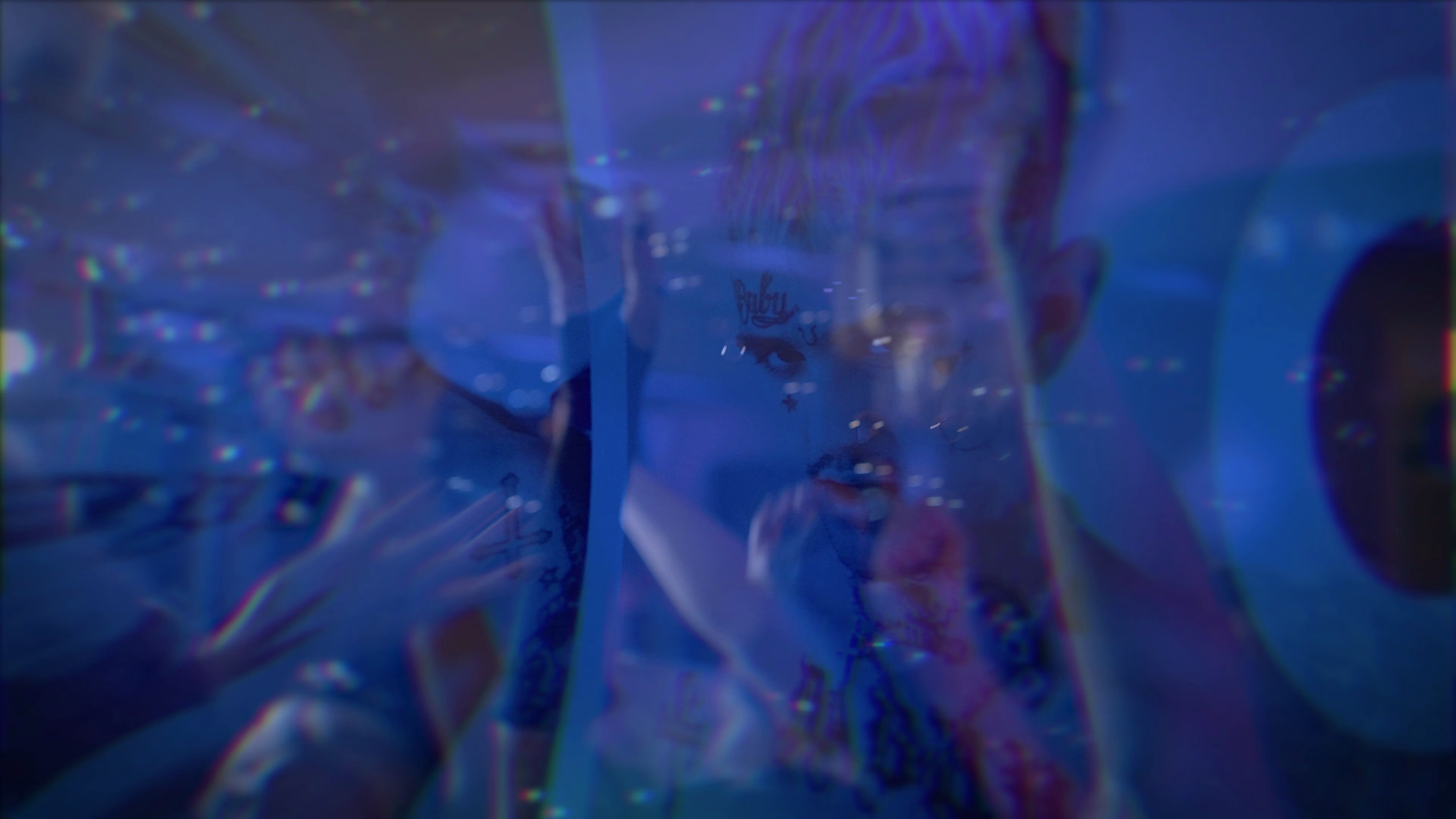 Reflected party scene captured as atmospheric artist content