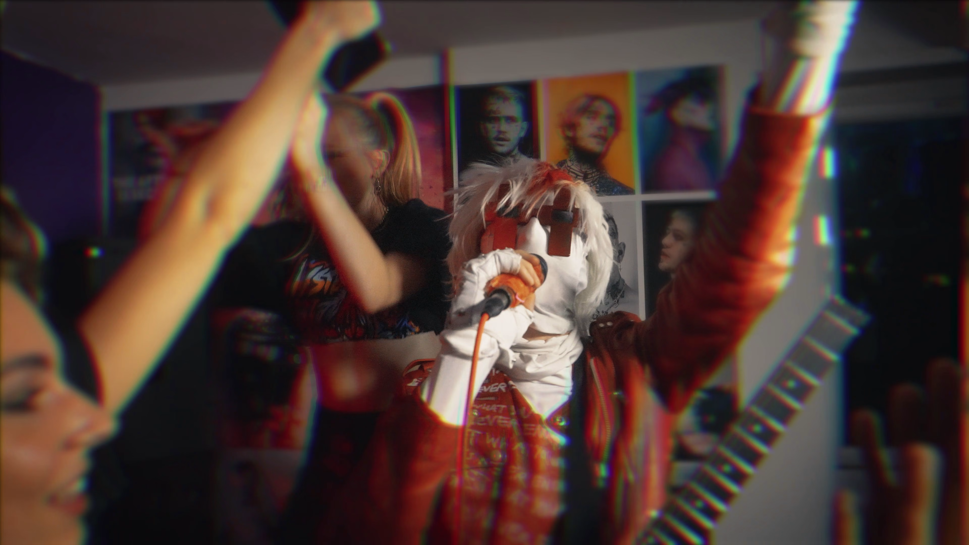 Mystery Man playing guitar among guests during the London music shoot