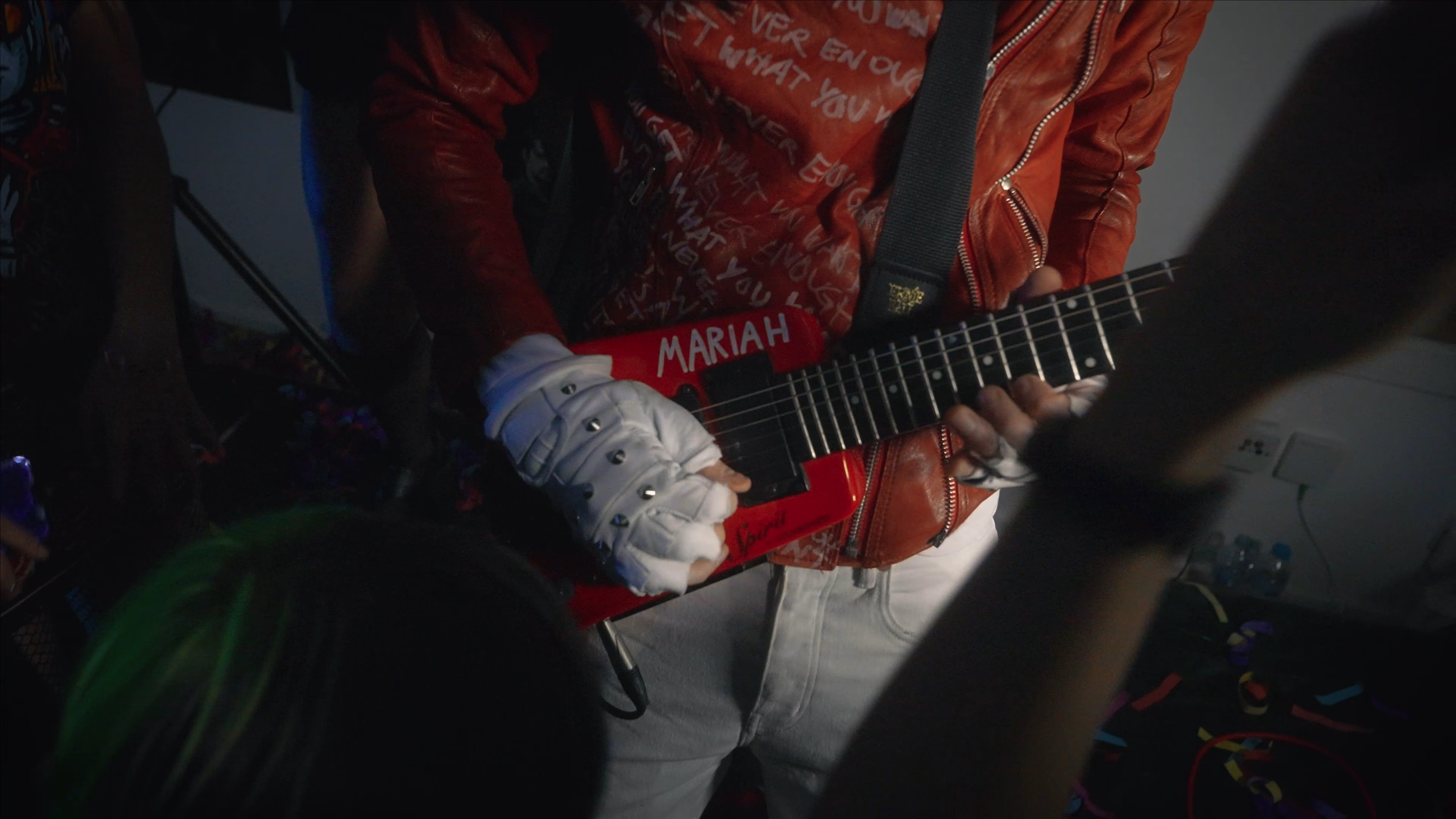 Close-up of the guitar during the artist performance